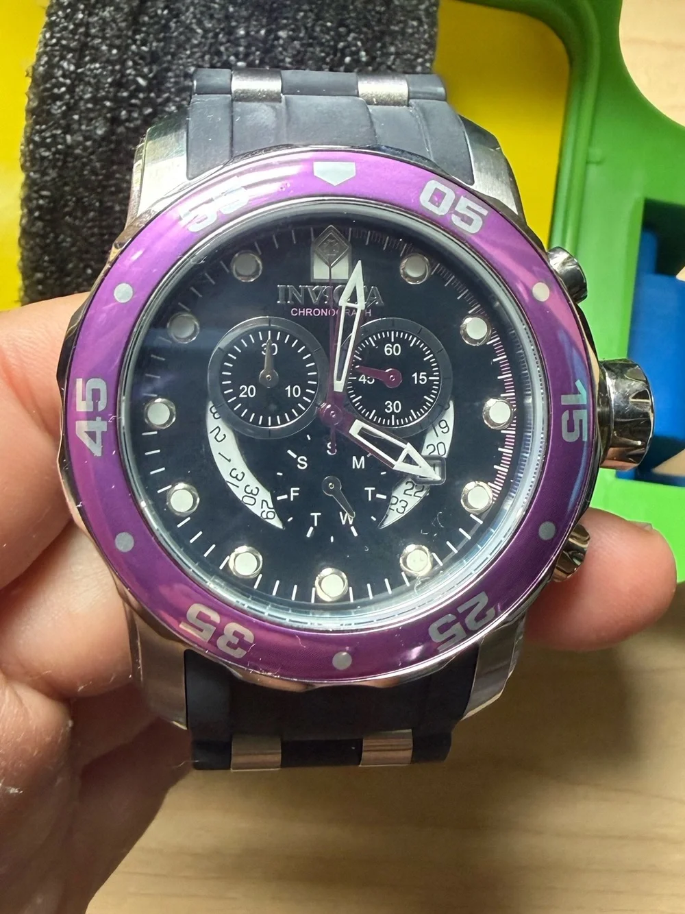 Invicta Men’s Black Dial Watch with Purple Bezel